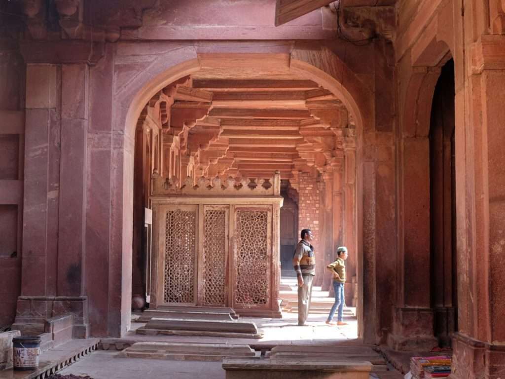 Man and boy inside Fatehpur Sikri