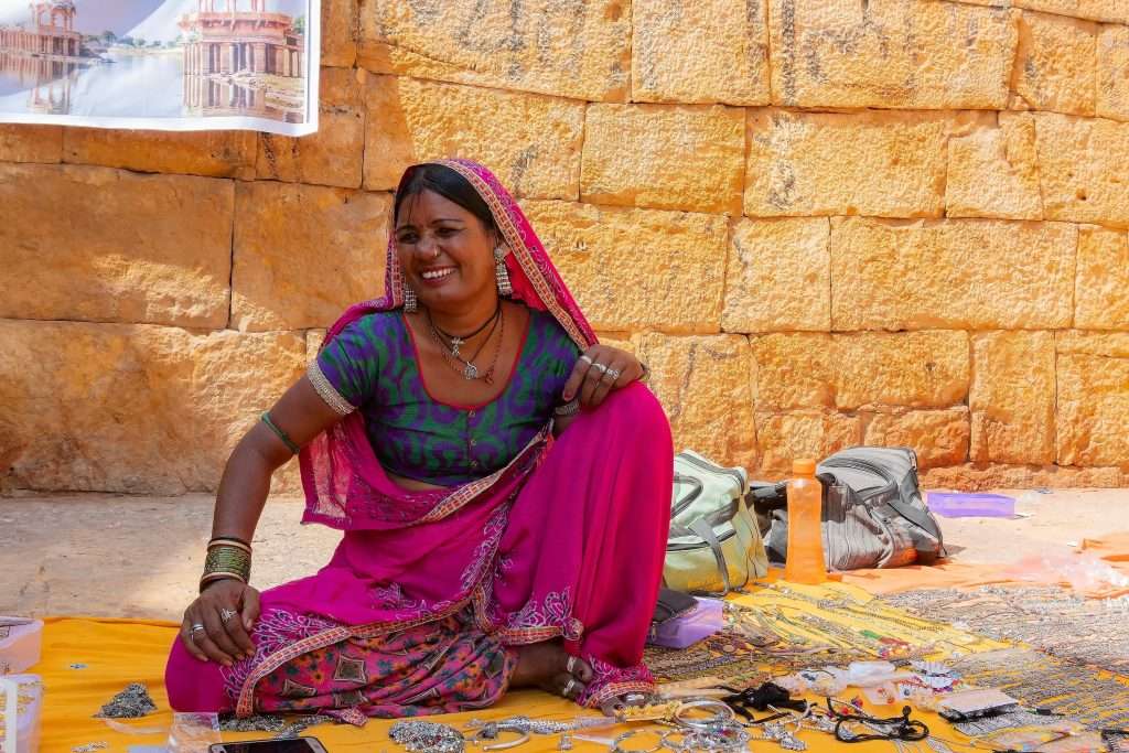Lady wearing a bright pink sari in Jaisalmer Fort